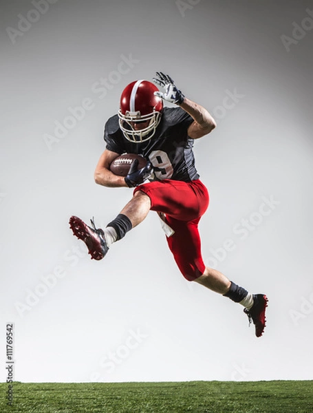 Fototapeta The american football player in action