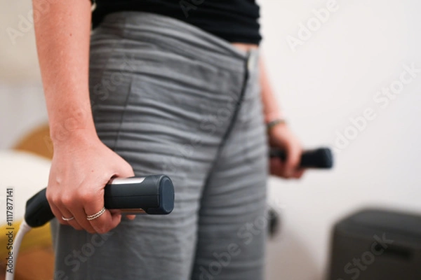 Fototapeta Patient using bioimpedance device for body composition analysis in nutrition clinic