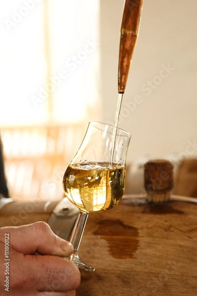 Fototapeta whiskey to pour from the barrel