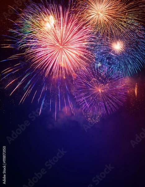 Fototapeta colorful fireworks explosions background in a dark blue sky