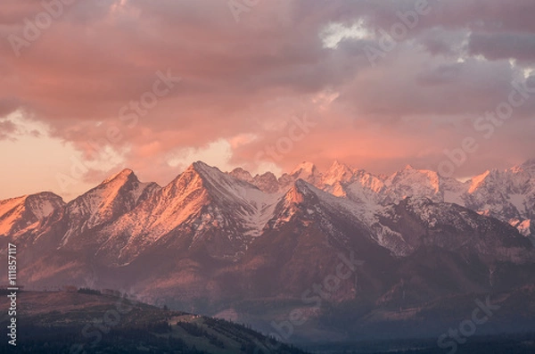 Fototapeta Cloudy Tatra mountains in the beautiful morning, covered with snow