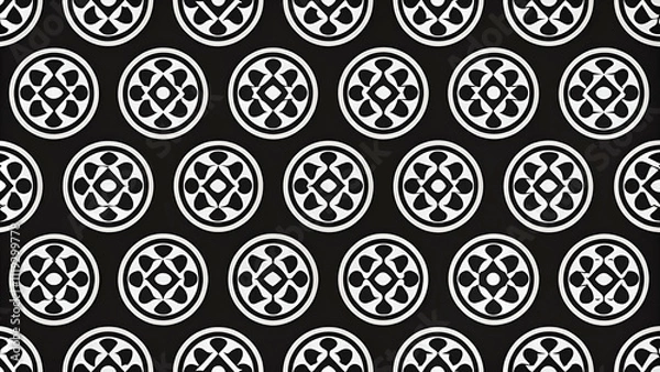 Fototapeta A repeating pattern of circular motifs in white on a black background, showcasing a modern, graphic design aesthetic.