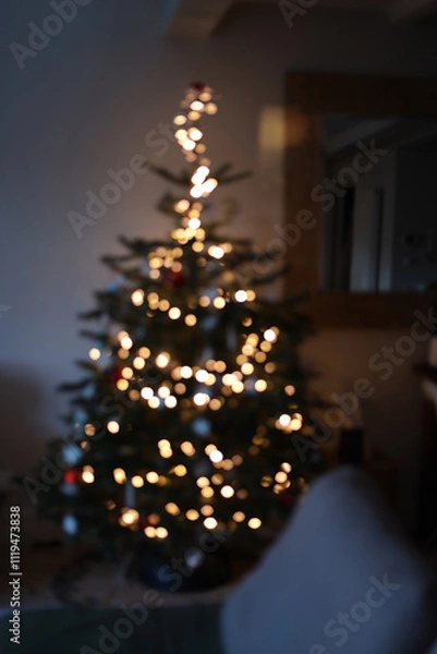 Fototapeta Christmas tree defocus bokeh effect. Festive mood. 