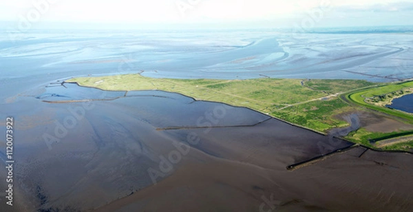 Fototapeta Aerial view of the tidal mudflats and channels of the Eemsdelta and Dollard, Groningen, The Netherlands