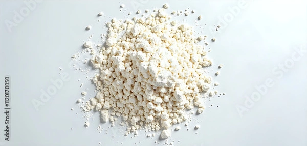 Fototapeta a pile of white flour is on the white table