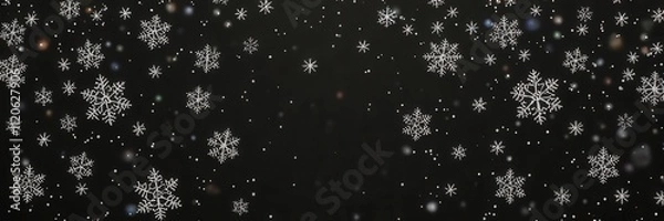 Fototapeta Falling snowflakes on a dark background creating a serene winter atmosphere, atmosphere, snow
