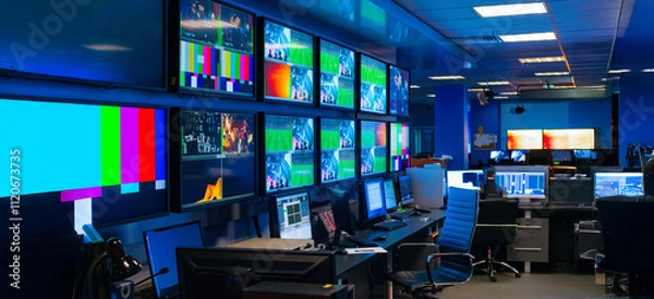Obraz abstract background with interior of control room in TV studio with monitors and equipment for banner background 