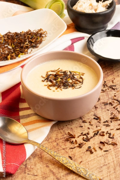 Obraz leek onion soup with chicken on a rustic table