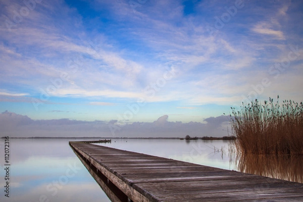 Fototapeta Long jetty Zuidlaardermeer on a cold day