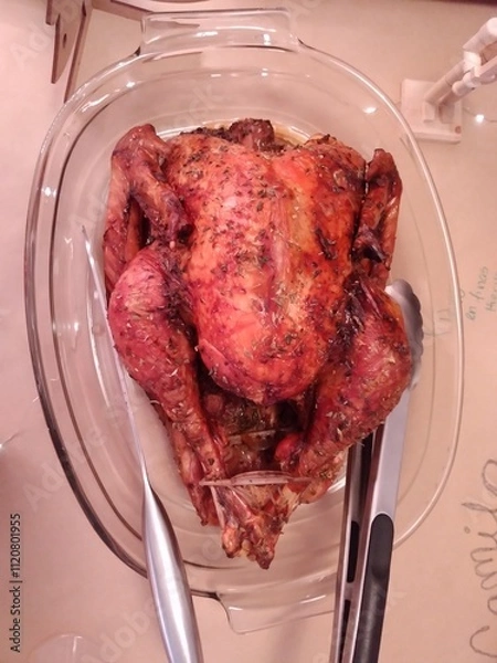 Fototapeta roast chicken inside glass tray