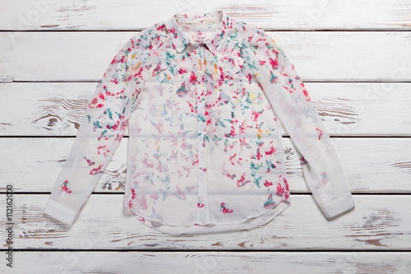 Fototapeta White shirt with butterfly print.