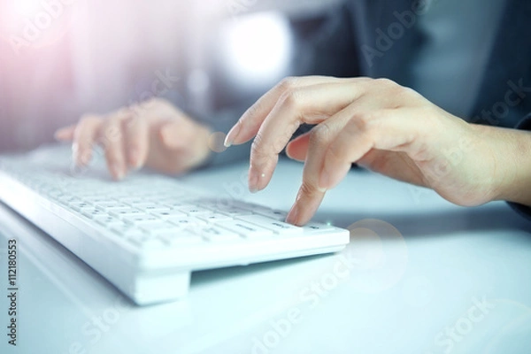 Fototapeta business woman hand typing on laptop keyboard