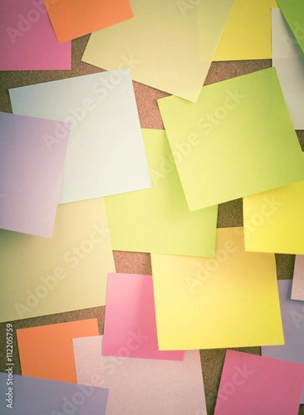Fototapeta Empty blank sticky notes on notice board in office. Background or backdrop for business information. Concept image of communication or reminder with copy space.