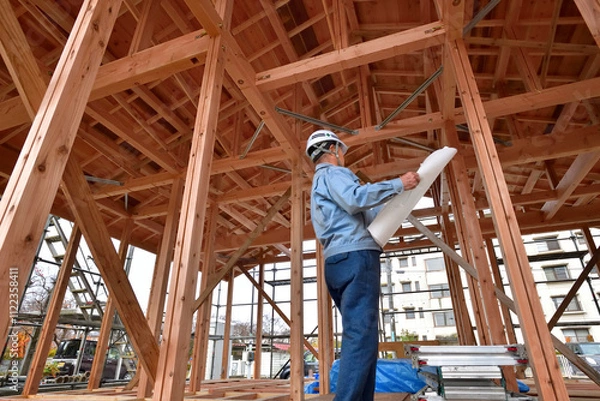Fototapeta 住宅建築工事・点検の設計エンジニア