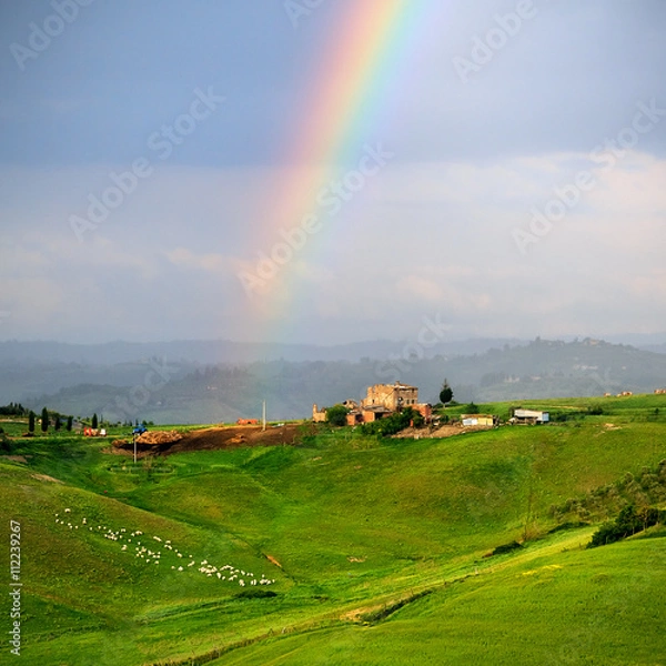 Obraz Rainow above tuscany green hills, Italy.