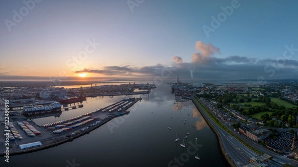 Obraz The image showcases a bustling waterfront scene at Dublin Port, featuring a modern bridge spanning across the harbour in Dublin Ireland