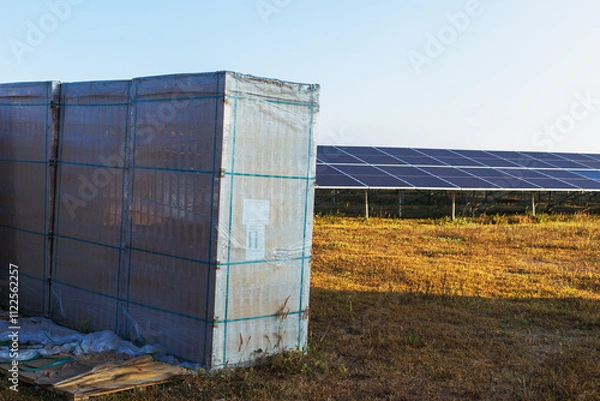 Fototapeta Solar panel boxes prepared for installation in power generation areas