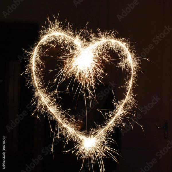 Obraz Herz gezeichnet mit brennender Wunderkerze