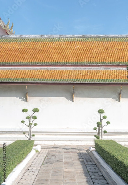 Obraz A minimalist-style image of a traditional Thai temple, showcasing clean architectural lines and a simple yet elegant design.