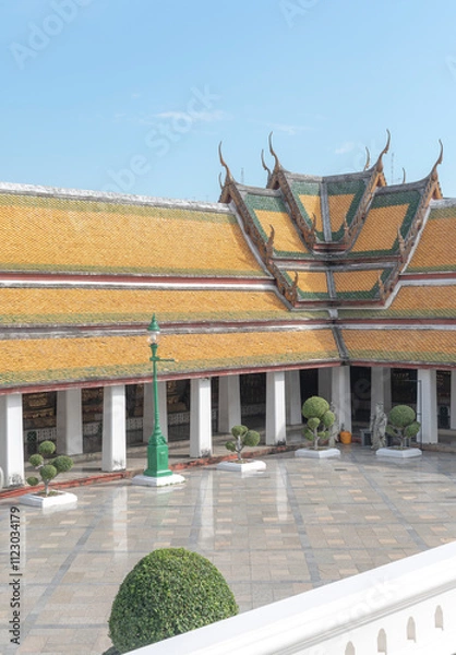 Obraz A minimalist-style image of a traditional Thai temple, showcasing clean architectural lines and a simple yet elegant design.