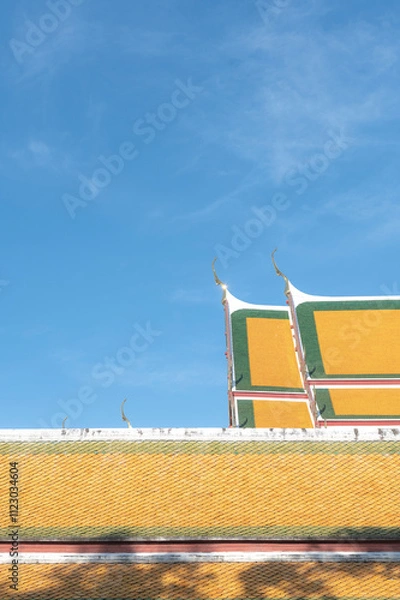 Obraz A minimalist-style image of a traditional Thai temple, showcasing clean architectural lines and a simple yet elegant design.