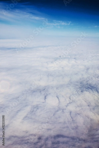 Fototapeta view panorama cloudscape from airplane window