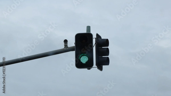 Obraz Green traffic light and Surveillance camera 