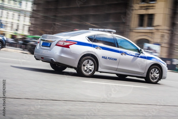 Obraz Police car move along an road