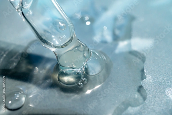 Fototapeta pipette with a drop of facial serum