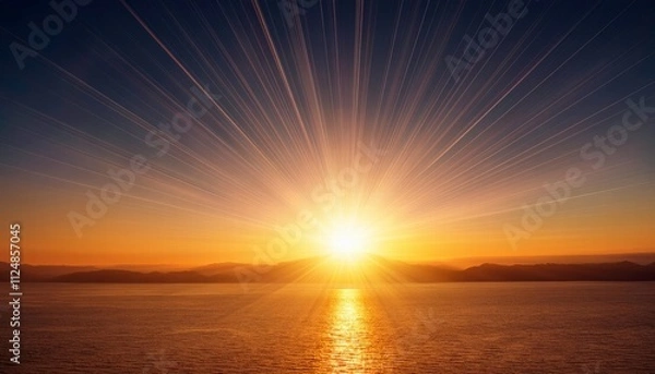 Obraz Sunrise Over Water: A breathtaking sunrise over a tranquil body of water, with the sun casting a golden glow over the serene landscape. The sky is ablaze with color.