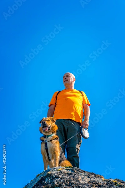 Obraz Mann mit Hund hochkant