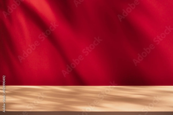 Obraz Empty table on bright pink wall background. Composition with leaves shadow on red the wall and beige table. Mock up for presentation, branding products, cosmetics, food or jewelry.	