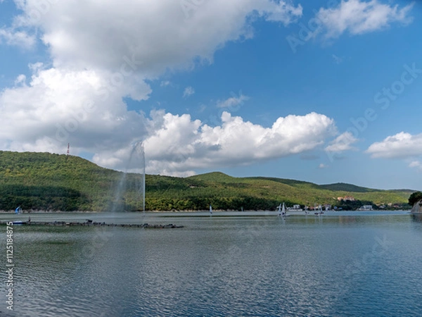 Obraz Abrau Durso, Russia 28 August 2024: Picturesque view of embankment of lake Abrau on sunny day in Abrau Durso