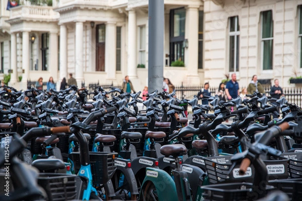 Fototapeta Lines of bicycles for hire in central London.