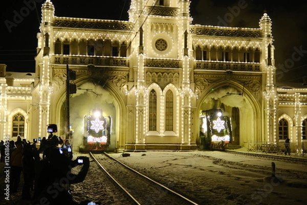 Obraz Christmas train with steam locomotive and illumination
