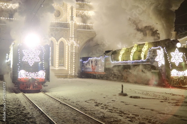 Fototapeta Christmas train with steam locomotive and illumination