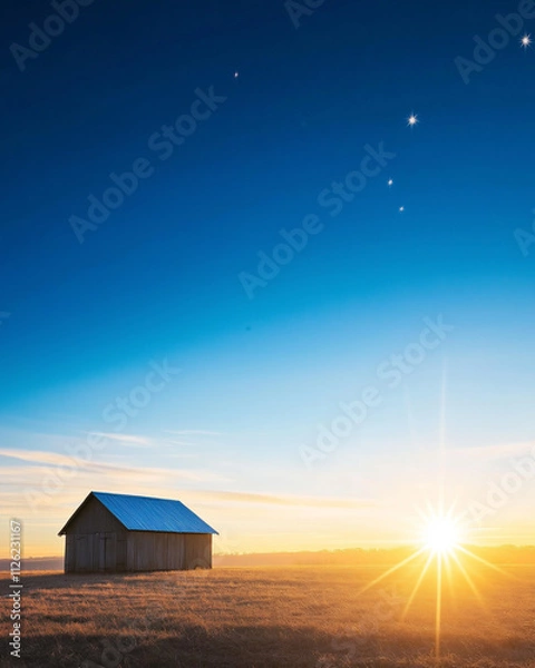 Fototapeta Rustic wooden house barn in an open field at sunrise under a clear blue sky. Concept of simplicity and calm.