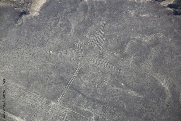 Fototapeta Aerial view of Nazca Lines - Hummingbird geoglyph, Peru.