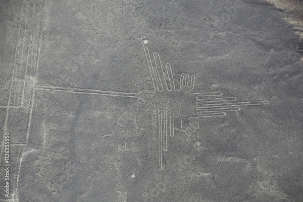Fototapeta Aerial view of Nazca Lines - Hummingbird geoglyph, Peru.