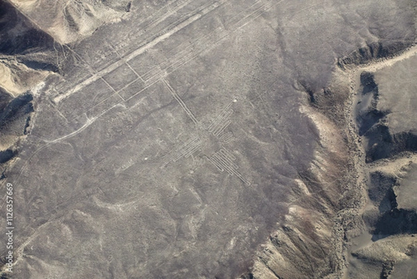 Fototapeta Aerial view of Nazca Lines - Hummingbird geoglyph, Peru.