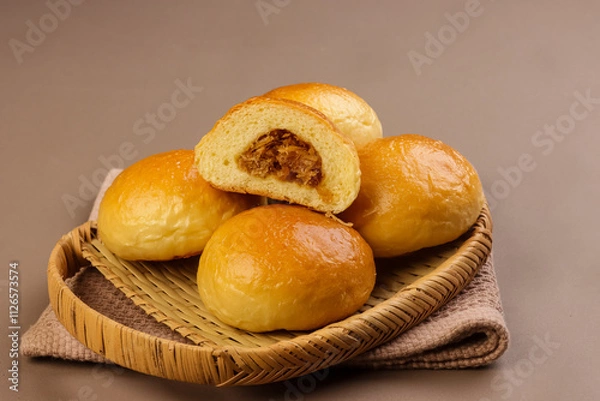 Obraz Pan De Coco is Filipino Coconut Bread Roll Uses Sweetened Shredded Coconut Meat as Filling.