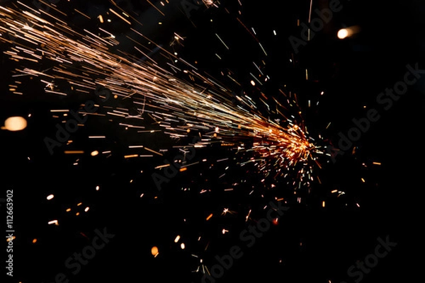 Obraz jasne iskry metalu