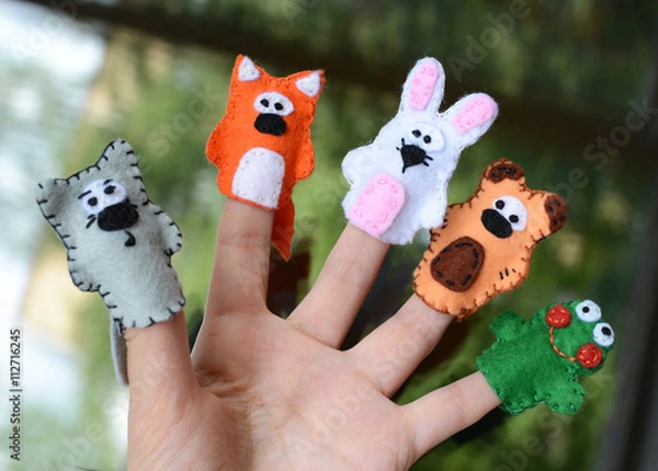 Obraz Hand wearing 5 finger puppets; wolf, fox, rabbit, bear, frog