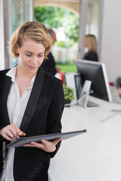 Obraz business woman with her staff, people group in background at office