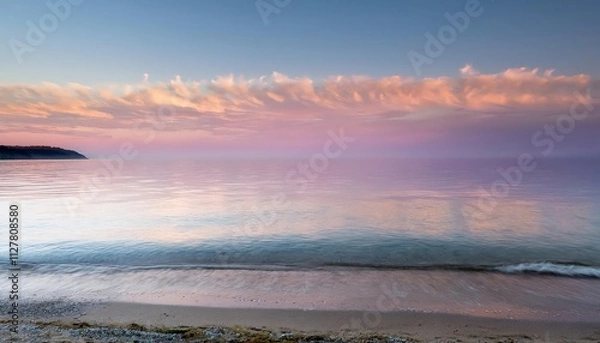 Fototapeta Soft light cascades through gentle clouds, transforming the morning sky into a canvas of hope.
