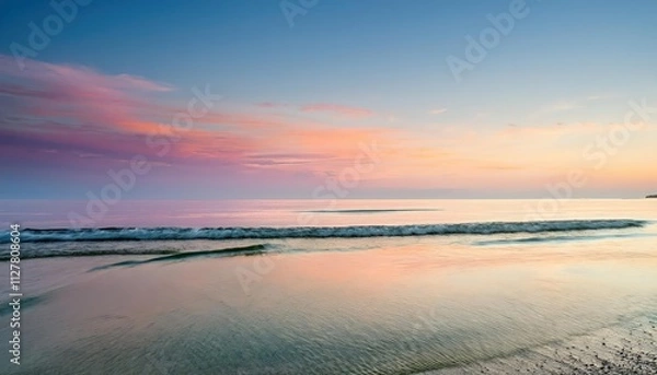 Fototapeta Golden sunlight pierces through wispy clouds, painting the azure sky with warmth and promise.
