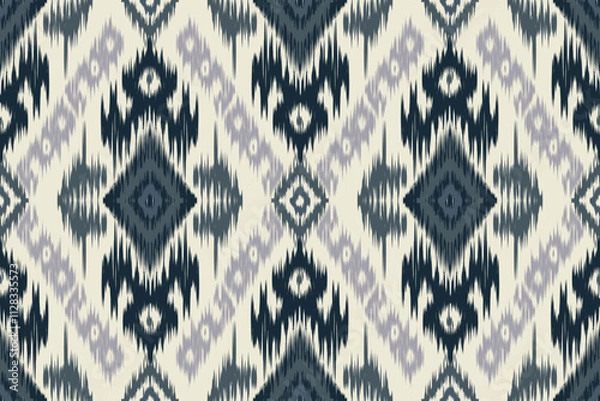 Fototapeta Seamless ethnic ikat pattern featuring tribal and folk embroidery combined with Mexican Aztec geometrics. Perfect for graphic art, rug design, wallpaper, wrapping and clothing.