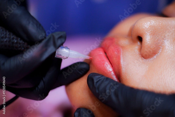 Fototapeta Lip tattoo process