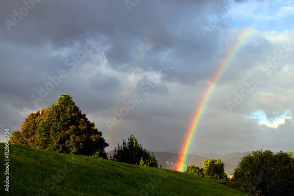 Fototapeta Rainbow on a stormy day in Bilbao.