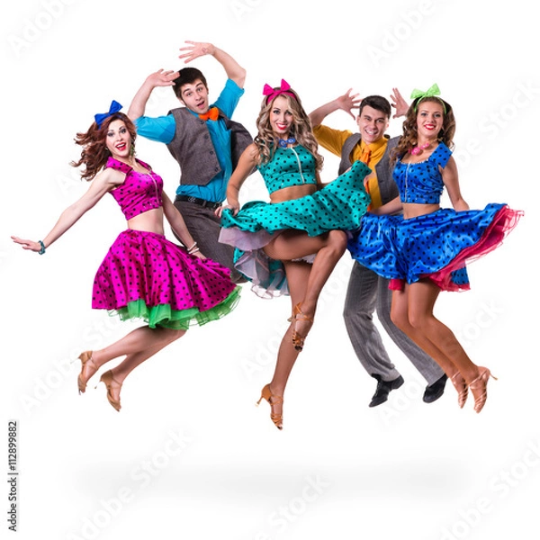 Fototapeta Cabaret dancer team jumping. Isolated on white background in full length.